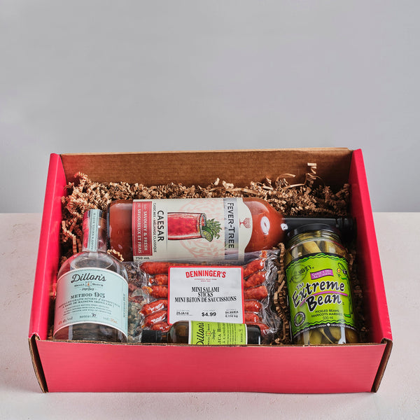 A box filled with everything you need to make a classic Caesar drink, it includes the vodka, Caesar mix, spicy beans, and Denninger's Salami sticks