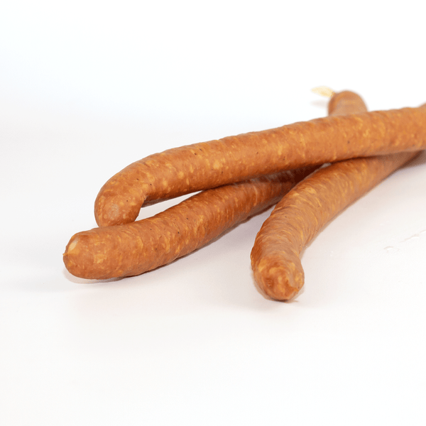 Three pieces of Denninger's Kabanossi sausage.