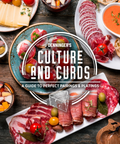 A styled food spread on a rustic wooden table featuring sliced cured meats, cheese wedges, olives, crackers, and dipping sauces, with a large central title reading 'Denninger's Culture and Curds: A Guide to Perfect Pairings & Plating.' This is not a clean isolated product shot; it shows the product in a real tabletop environment with food props, so subject_type is Lifestyle rather than Product/Packaging.