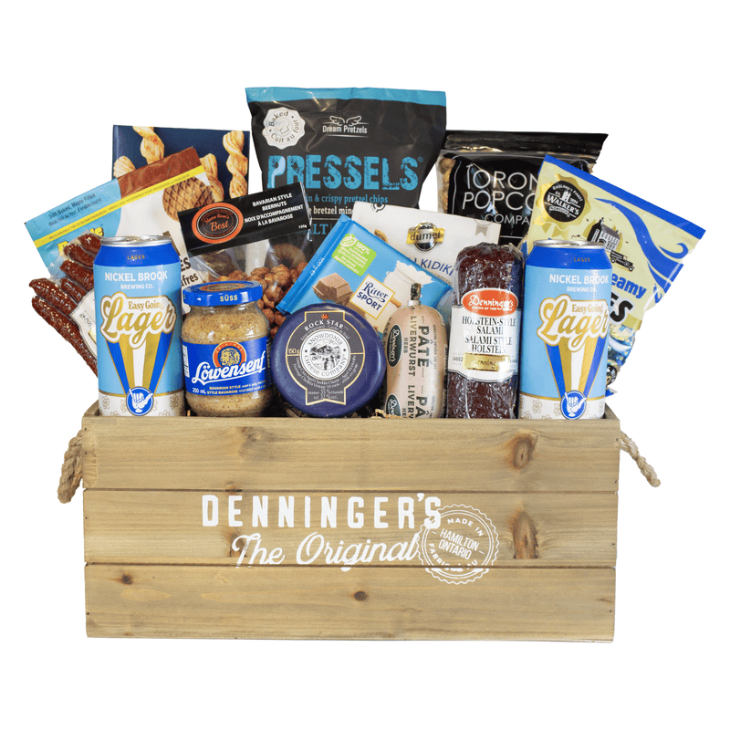 The meat and beer crate gift basket includes a variety of meats (mini salami sticks, pate, salami chub), salty snacks, popcorn, cheese, sweets and two nickelbrook brewing beers. All wrapped up in a wooden crate.
