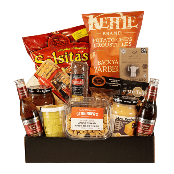 A simple black box filled with tortilla chips, bbq chips , maple cookies, two salsas, salami, mustard, two colas, peanuts, chocolate bar, and fudge.