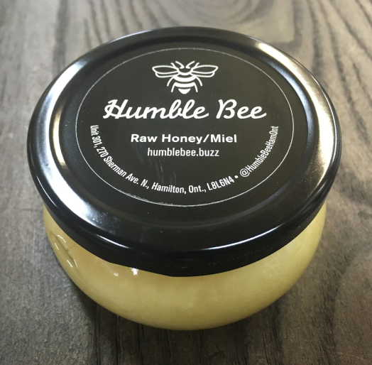 130 g glass jar of Humble Bee raw honey