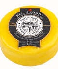 Encased in a bright yellow wax 200 grams Snowdonia Beechwood cheese  naturally  smoked cheddar.