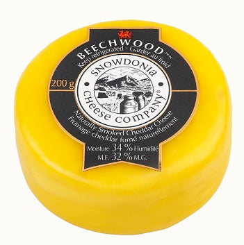 Encased in a bright yellow wax 200 grams Snowdonia Beechwood cheese  naturally  smoked cheddar.