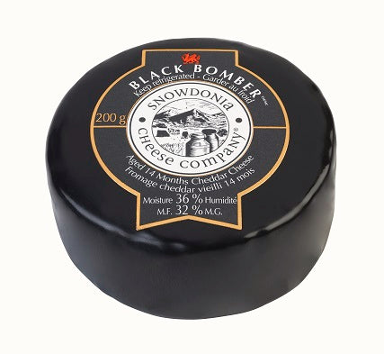 Encased in black wax 200 grams of Snowdonia Black Bomber 14 month aged cheddar.