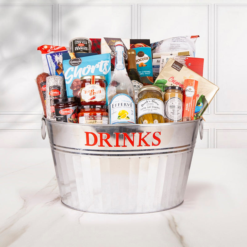 the Summer Cottage Gift Basket is packed with all the goodies you need! From crackers to salami and cheese, popcorn and chips, chocolate and cookies, and everything in between - this is the perfect gift basket to celebrate summer! 