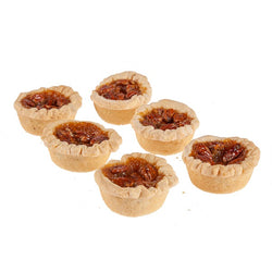 Picture of six loose pecan  tarts.
