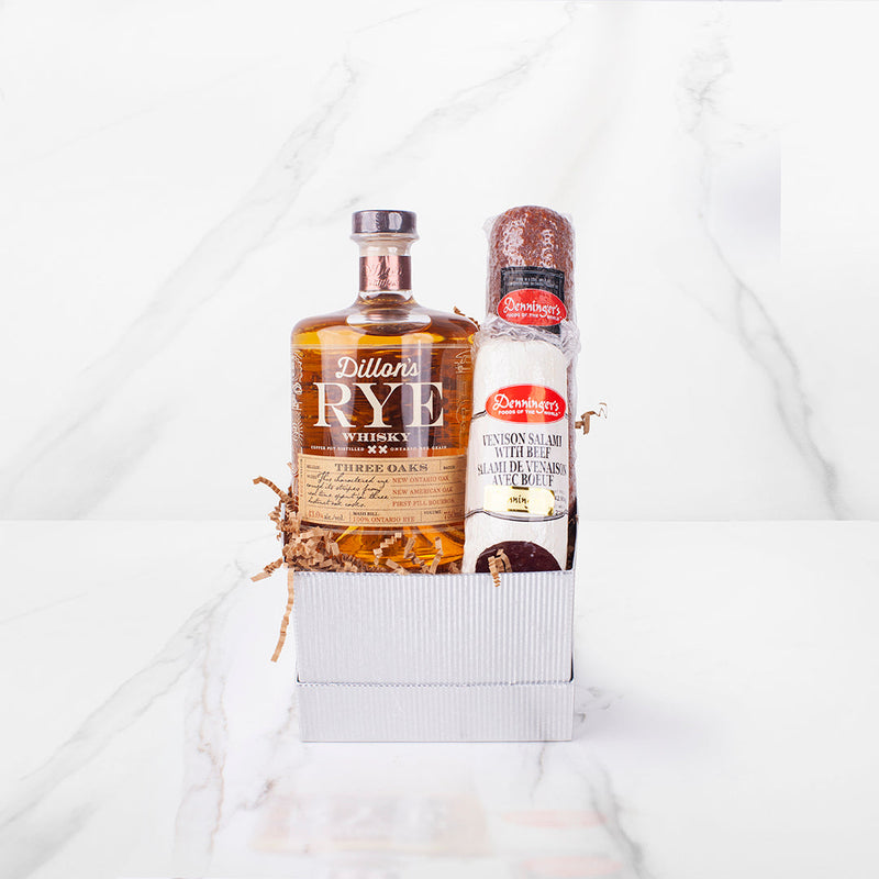 The whisky lovers gift box comes with a luxurious 750ml bottle of rye whisky, a venison salami, and a hungarian tokay salami. All wrapped in a nice silver box and topped with a bow.